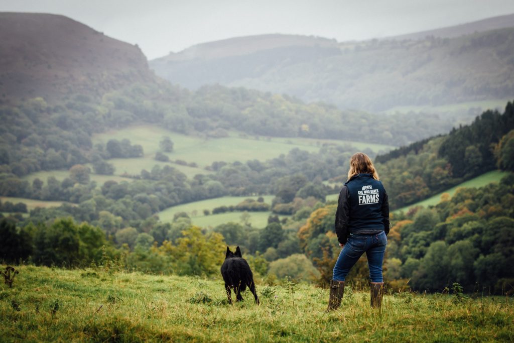 She who dares farms. Shepherdess looking over her farm. 